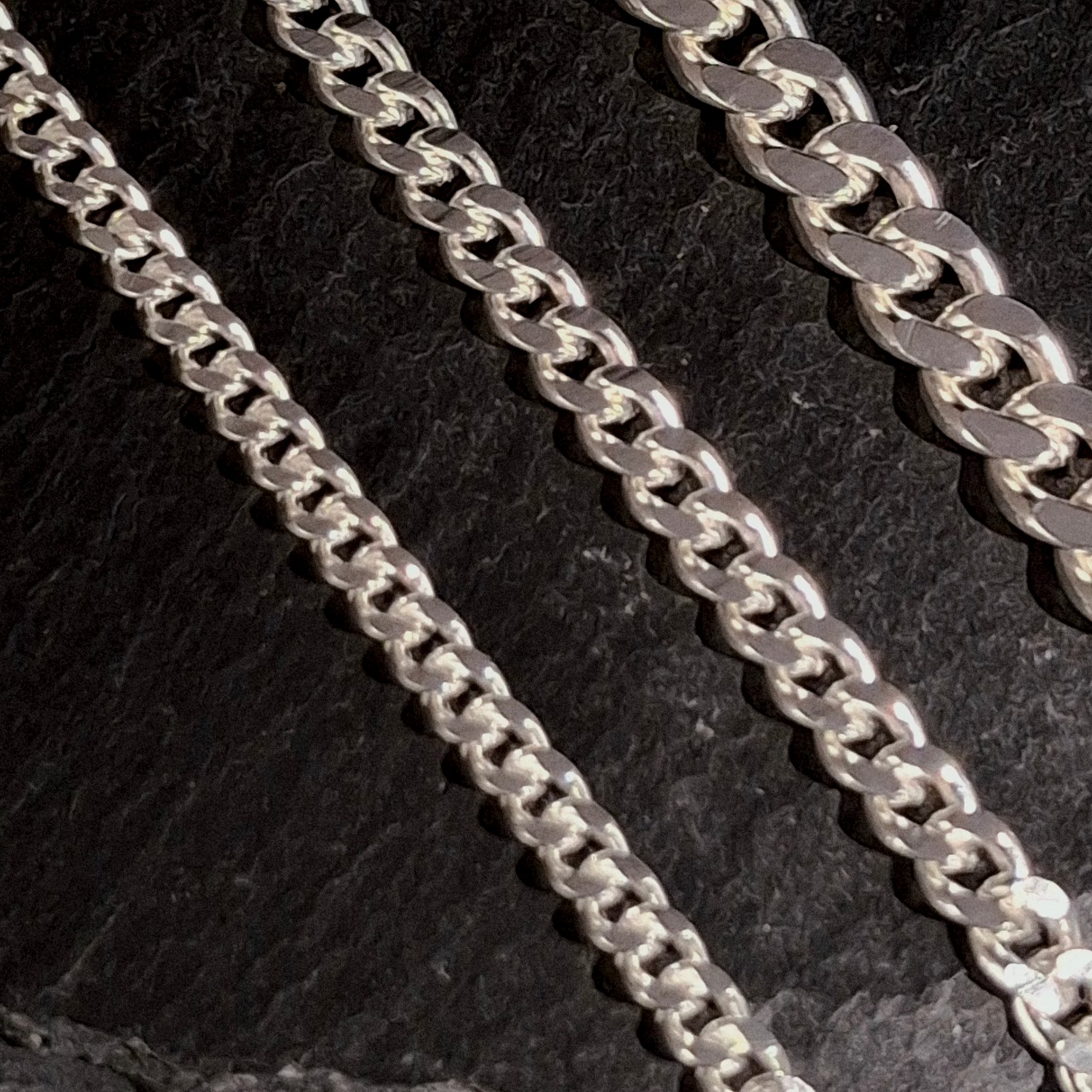 Display of Sterling silver sizes Cuban link chains for wholesale jewellery.