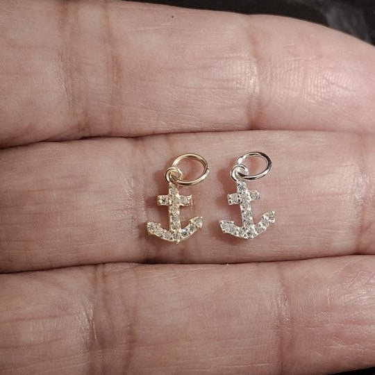 Close up image of sterling silver anchor pendant charm with zircons SSAV